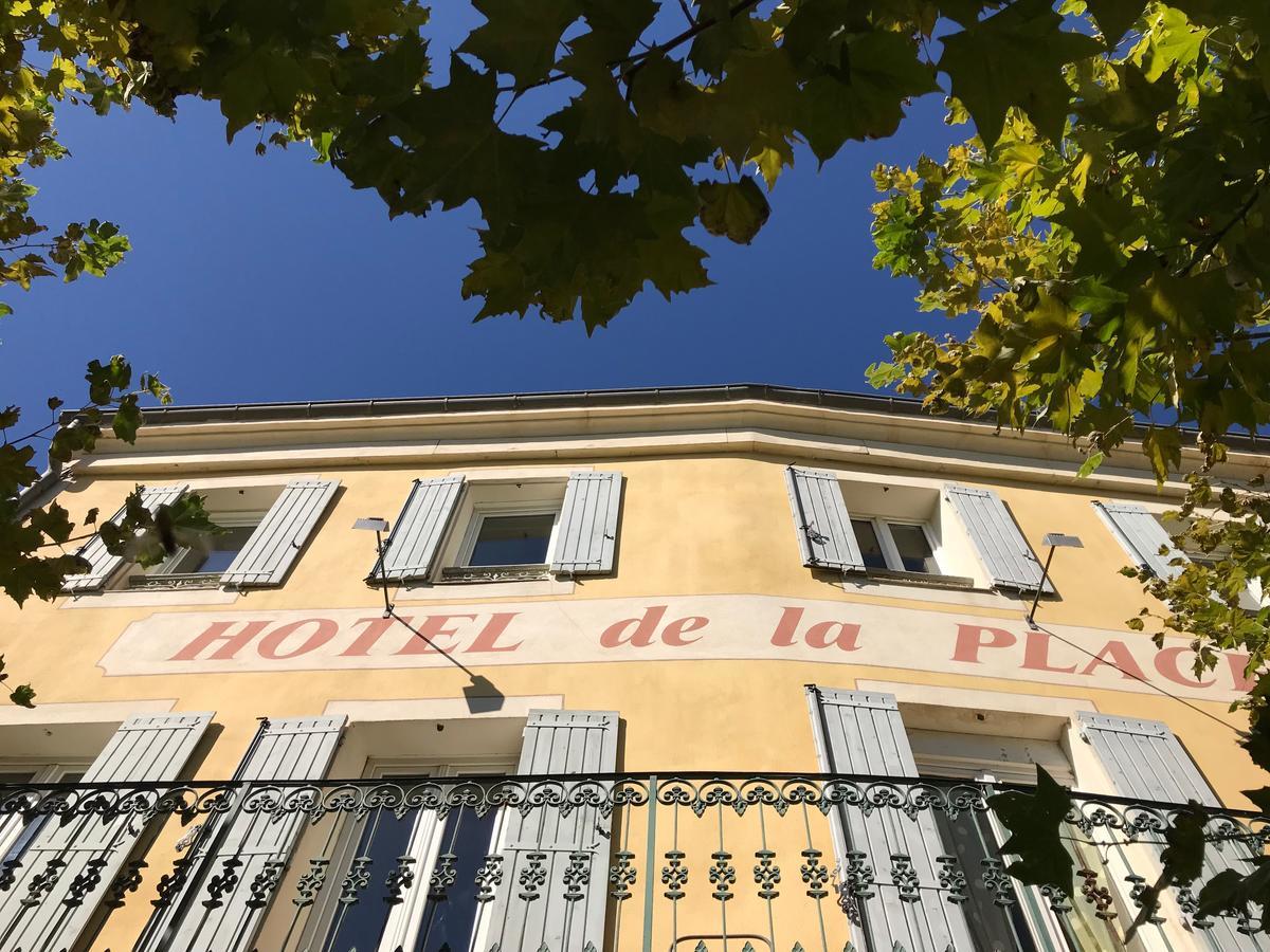 Bar Hotel De La Place Mezel Exterior photo